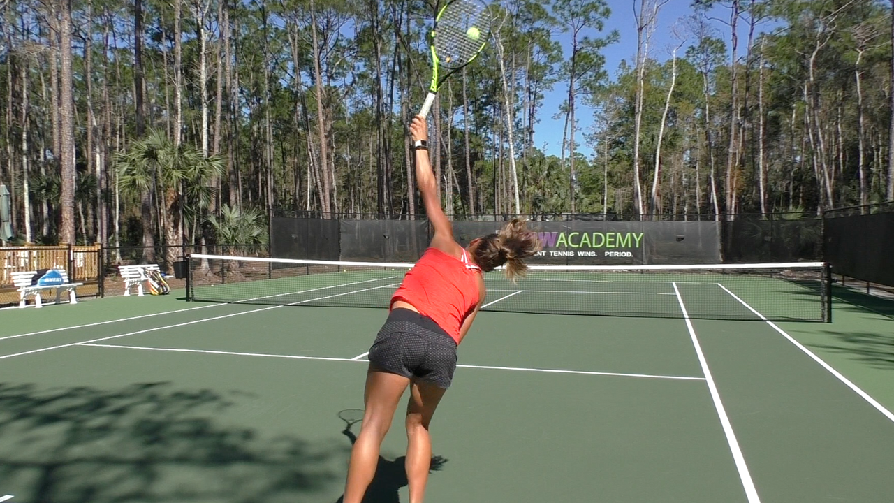 how to improve your serve - stop hitting balls intot the net